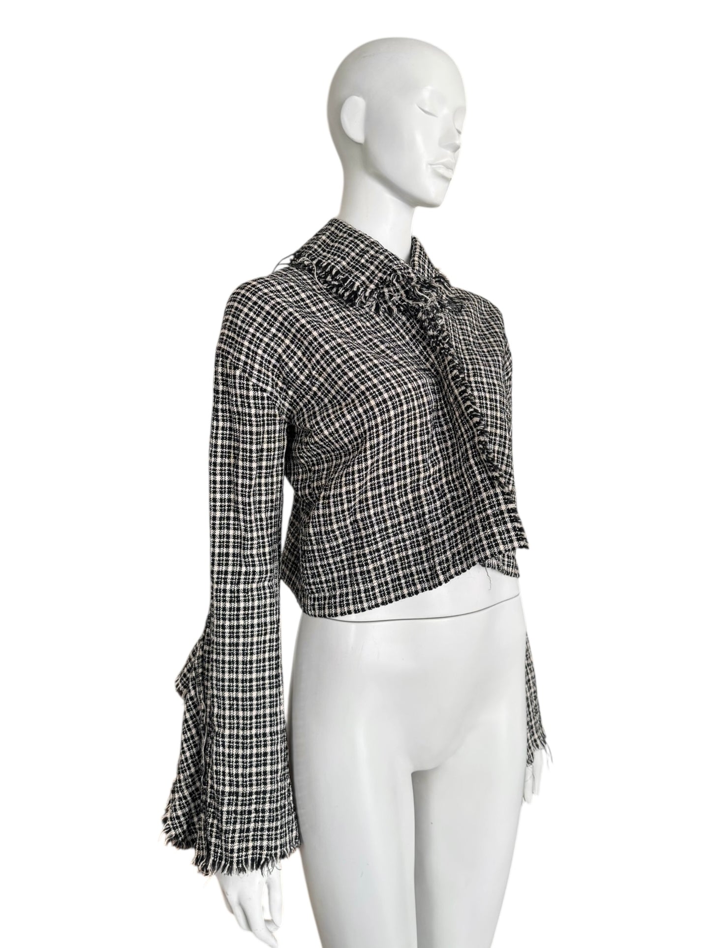 Junya Watanabe Comme des Garçons – Veste courte texturée
Fall / Winter 2004 –