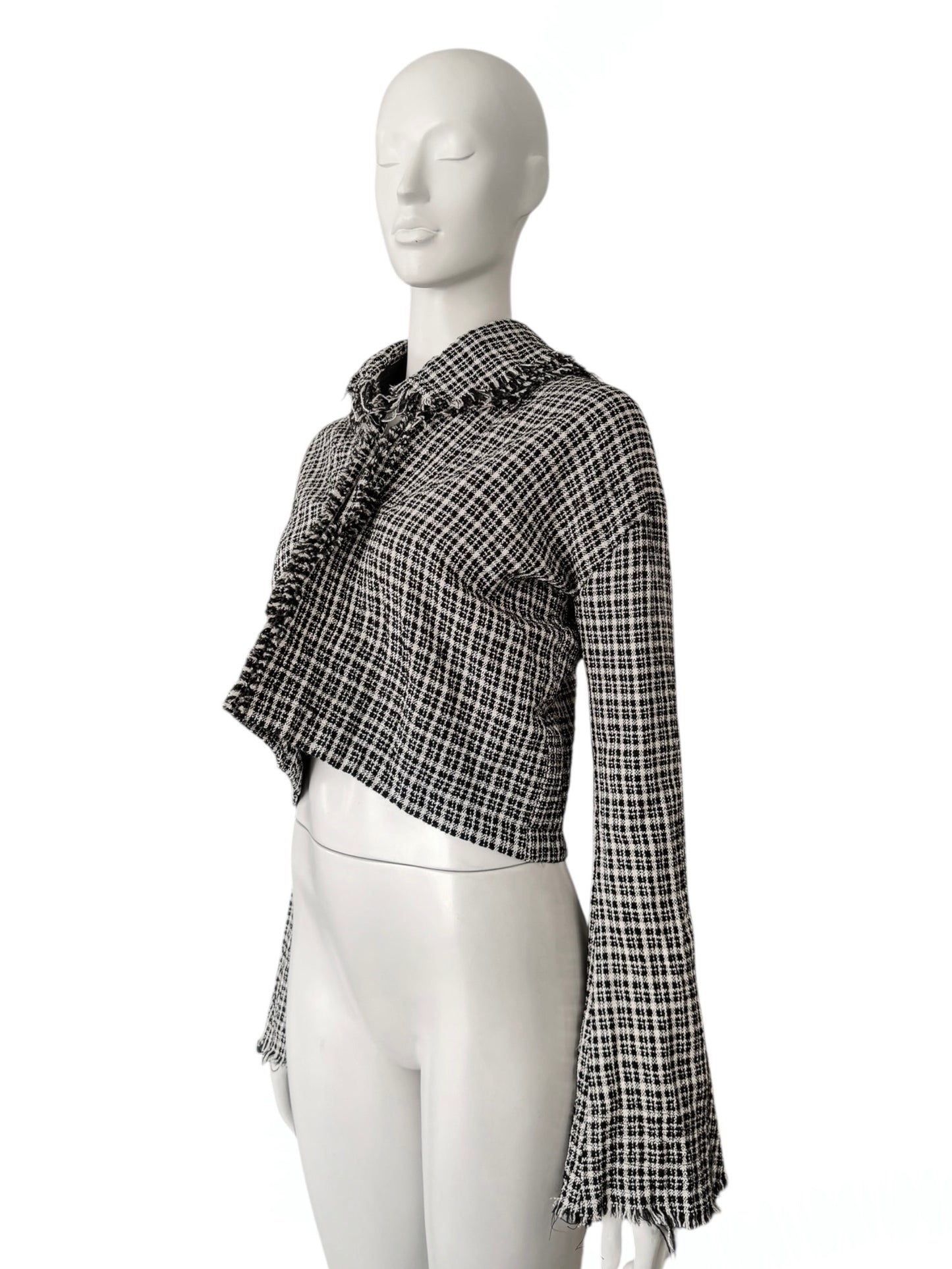 Junya Watanabe Comme des Garçons – Veste courte texturée
Fall / Winter 2004 –